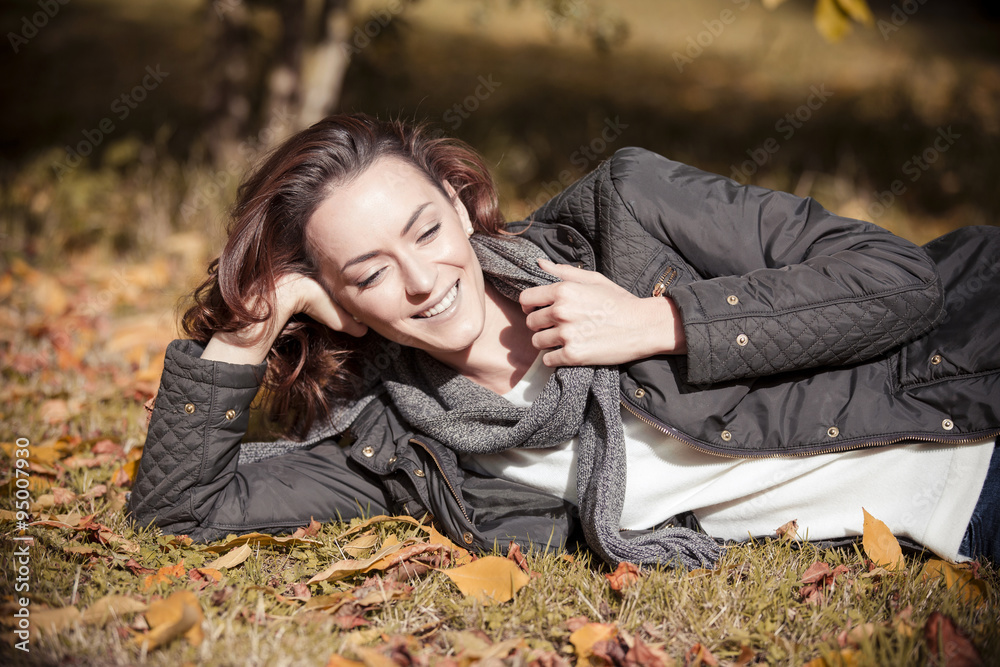 Woman out walking in the autumn sun Woman out walking in the autumn sun