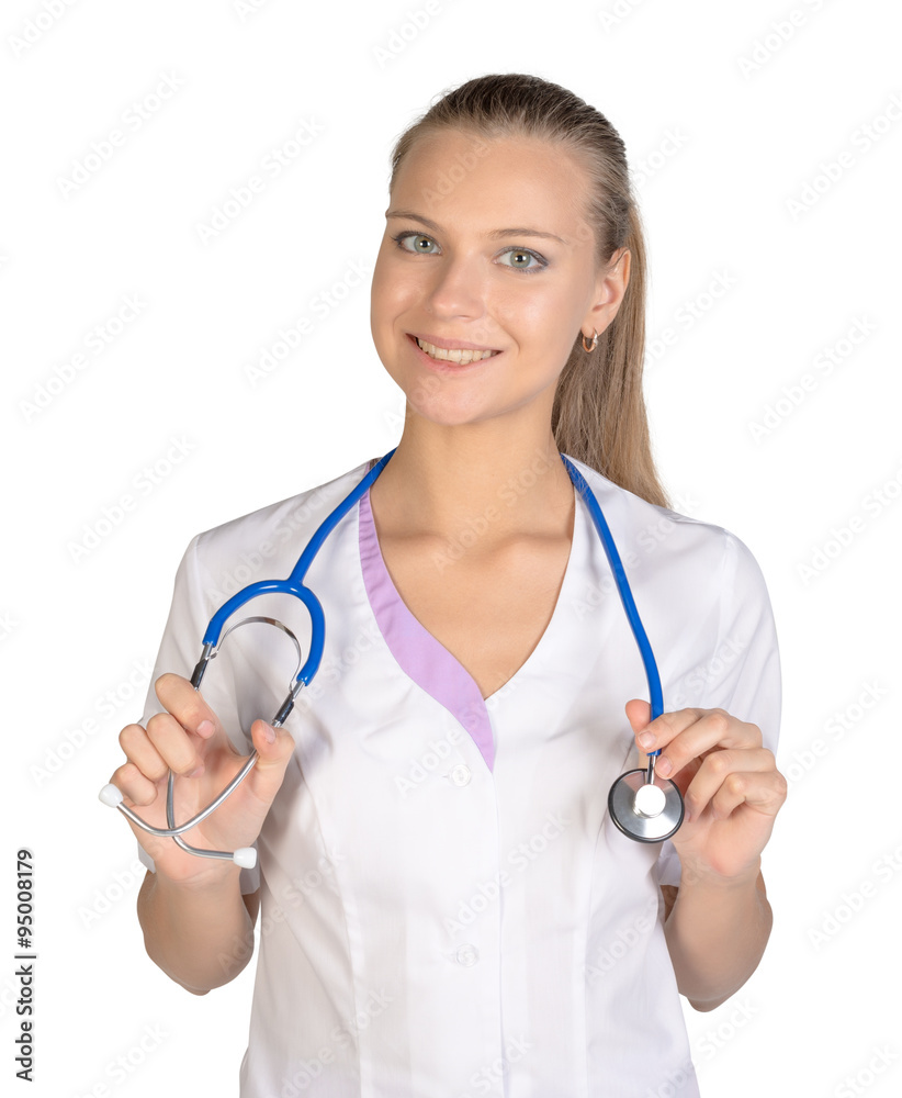 Beautiful smiling doctor woman holding stethoscope over isolated white background Beautiful smiling doctor woman holding stethoscope over isolated white background