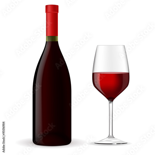 A bottle of red wine with a glass. 