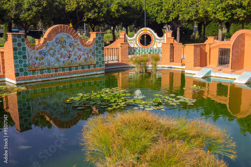 Andalusian style nice pond in the park of Malaga, Spain