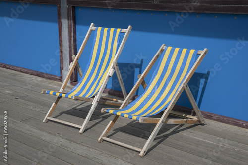 Two Blue and Yellow Deckchairs