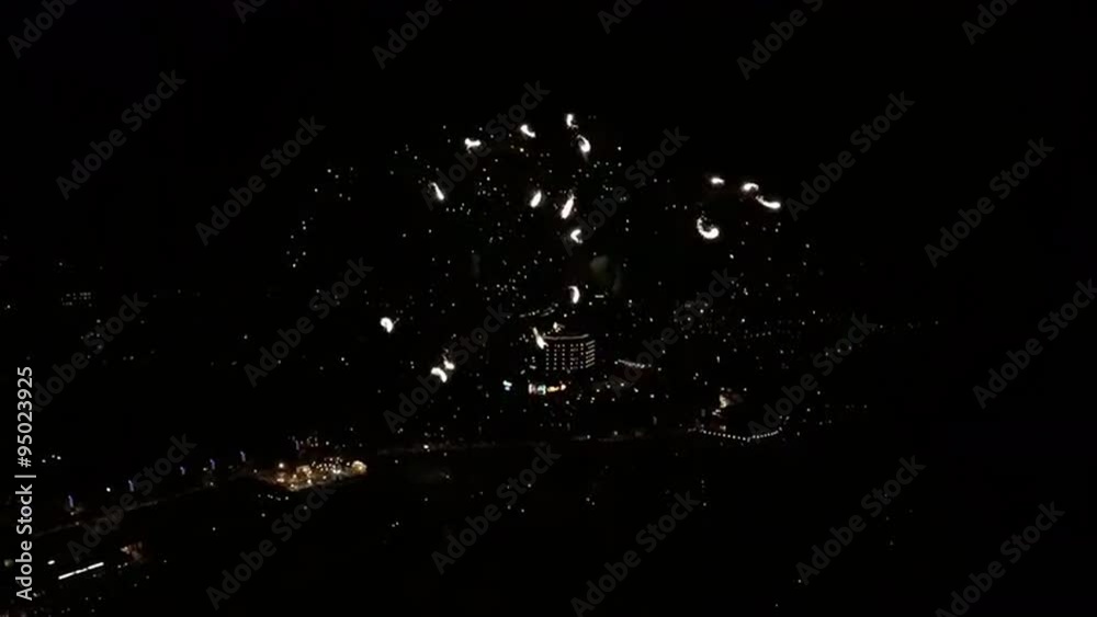 AERIAL SLOW MOTION: Beautiful fireworks above the city AERIAL SLOW MOTION: Beautiful fireworks above the city