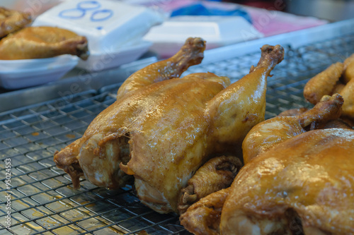 Boiled chicken in market photo