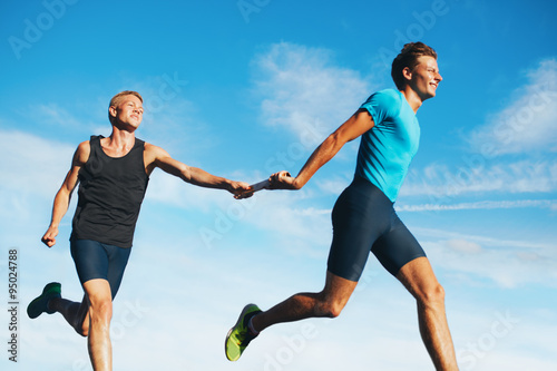 Tableau sur toile Young athletes running in a track relay