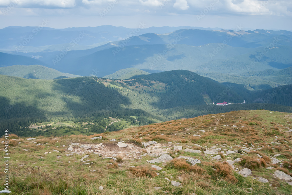 View of Carpathians overlooking a valley with a large mountain t