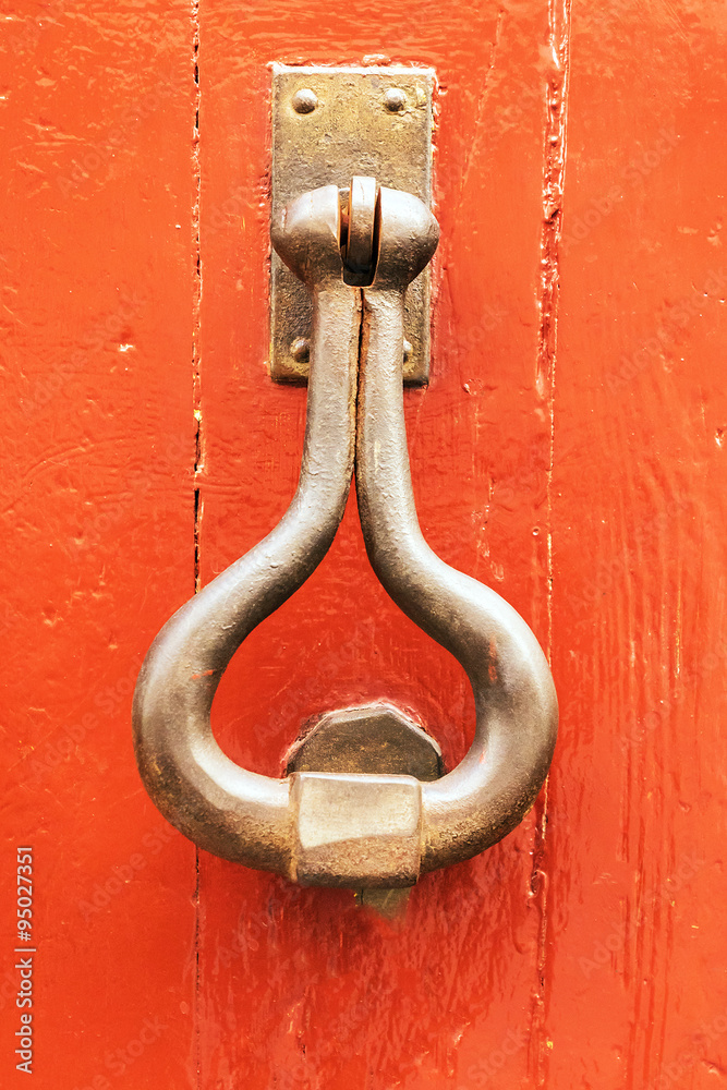 Vintage iron handle on old door
