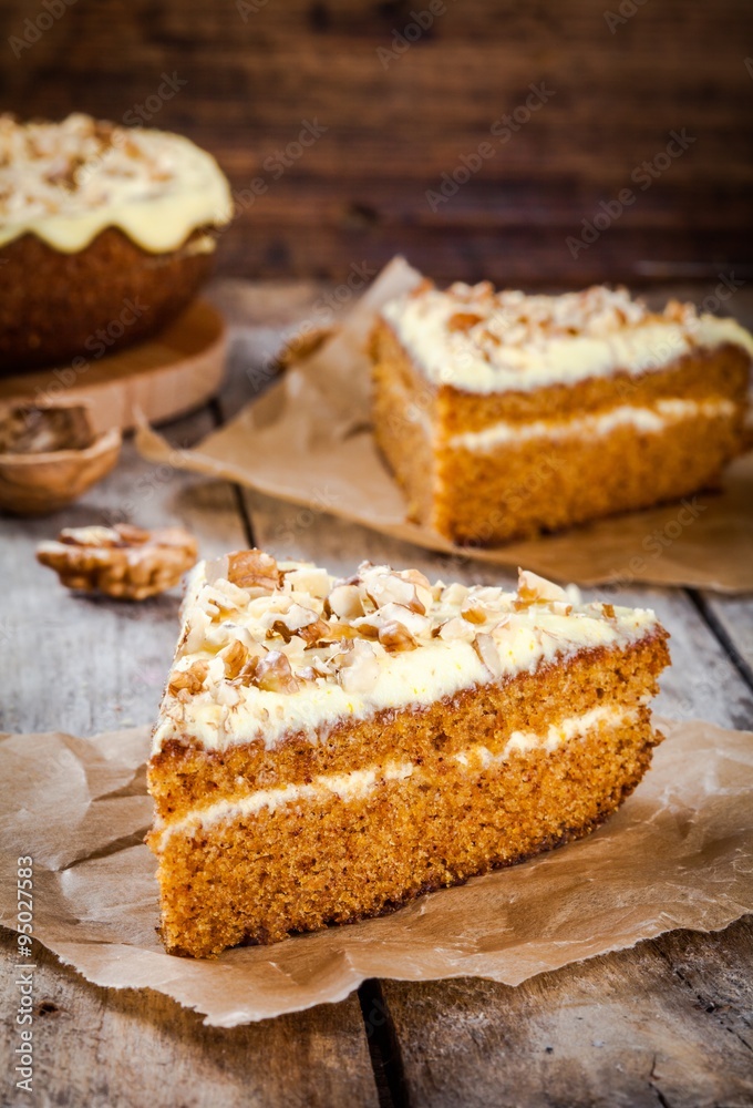Piece of homemade carrot cake with walnuts Piece of homemade carrot cake with walnuts