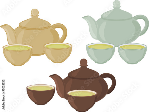 The teapot and small cups of Chinese green tea. Set of isolated objects.