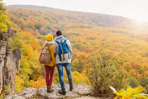 Beautiful couple in autumn nature