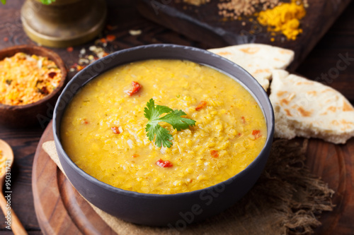Red lentil Indian soup with flat bread. Masoor dal.  photo