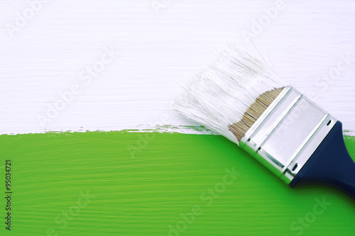 Painting green surface with white paint