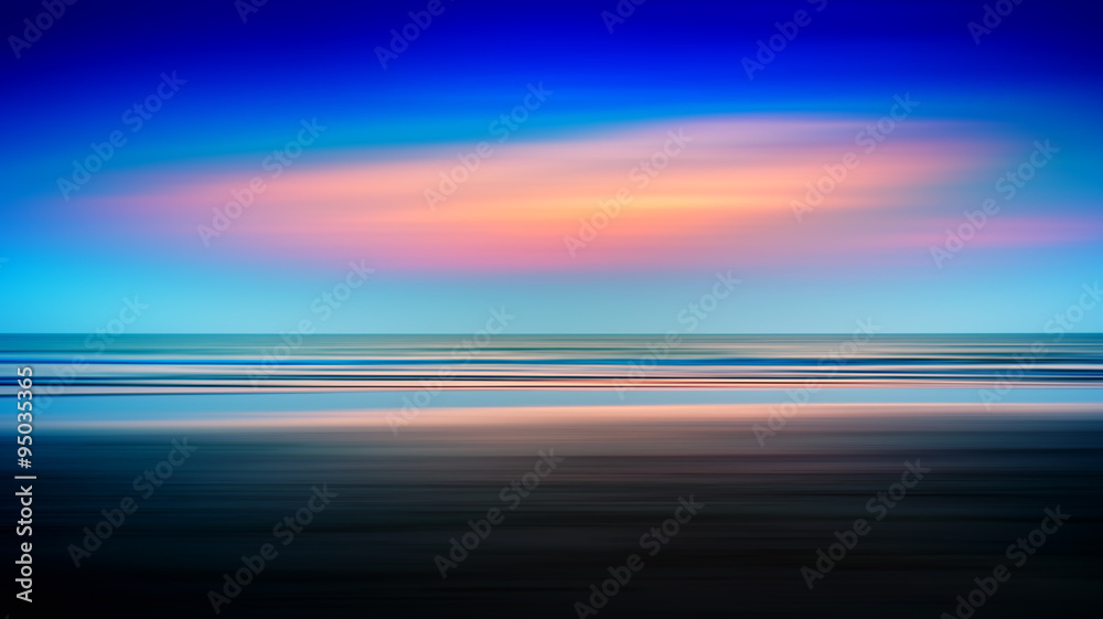 Horizontal vivid varitone ocean sunset horizon blur abstraction
