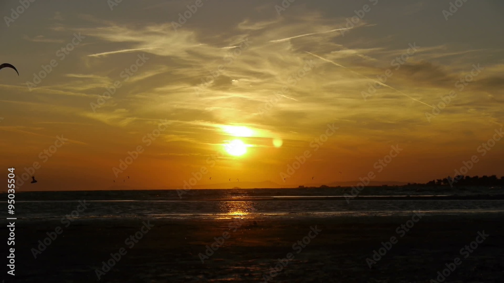 Kiteboarding at sunset