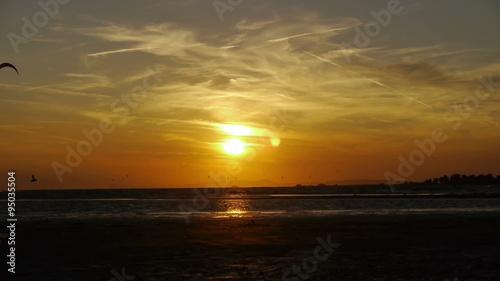 Kiteboarding at sunset