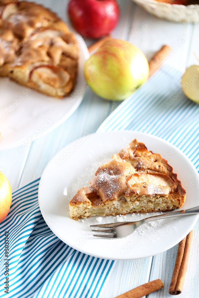 Homemade apple cake on blue wooden table Homemade apple cake on blue wooden table