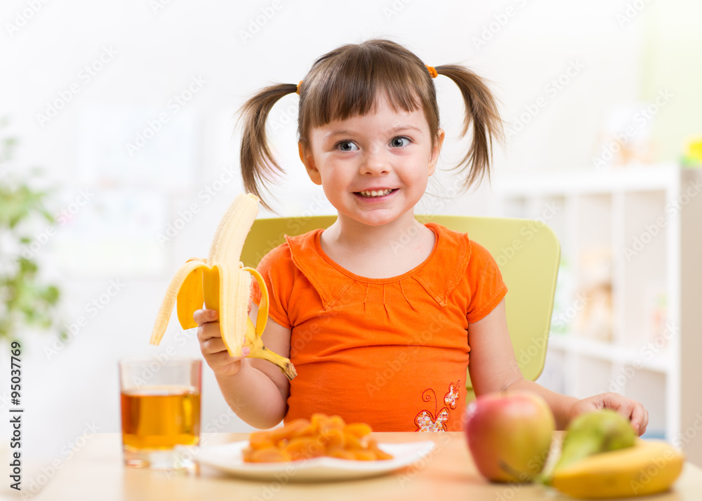 child eating healthy food at home child eating healthy food at home