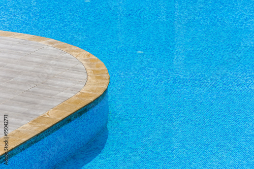 Edge of swimming pool. Barriers to exit the pool.