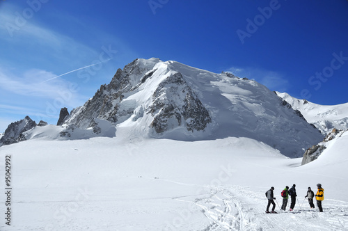 a group of skiers, on the Vallee Blanche in front of the Mt Blanc. Chamonix, France