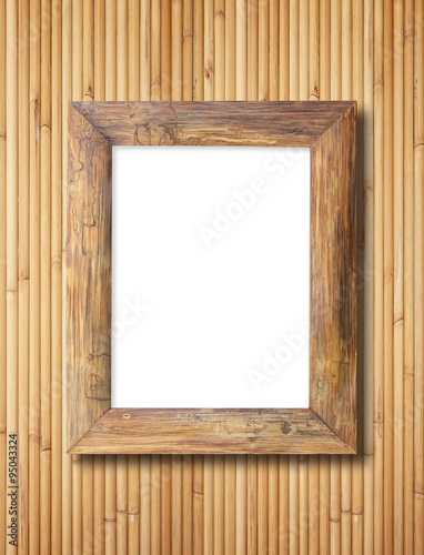 blank wooden frame on bamboo wall background