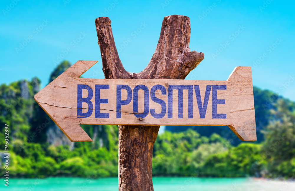 Be Positive arrow with beach background