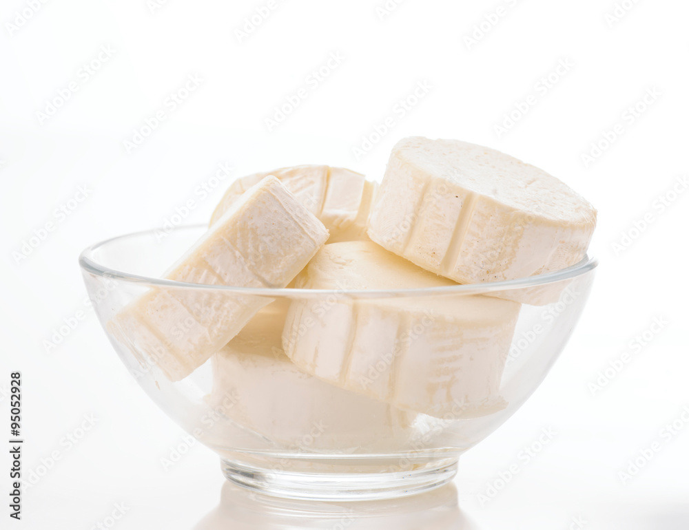Lots of goat cheese in transparent bowl