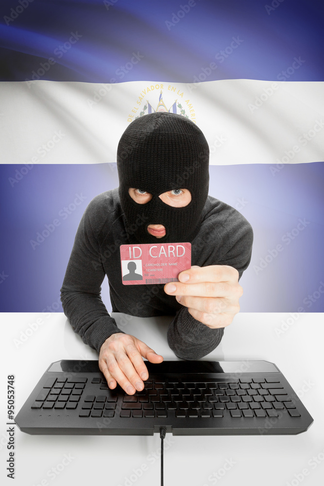 Hacker with flag on background holding ID card in hand - El Salvador Hacker with flag on background holding ID card in hand - El Salvador