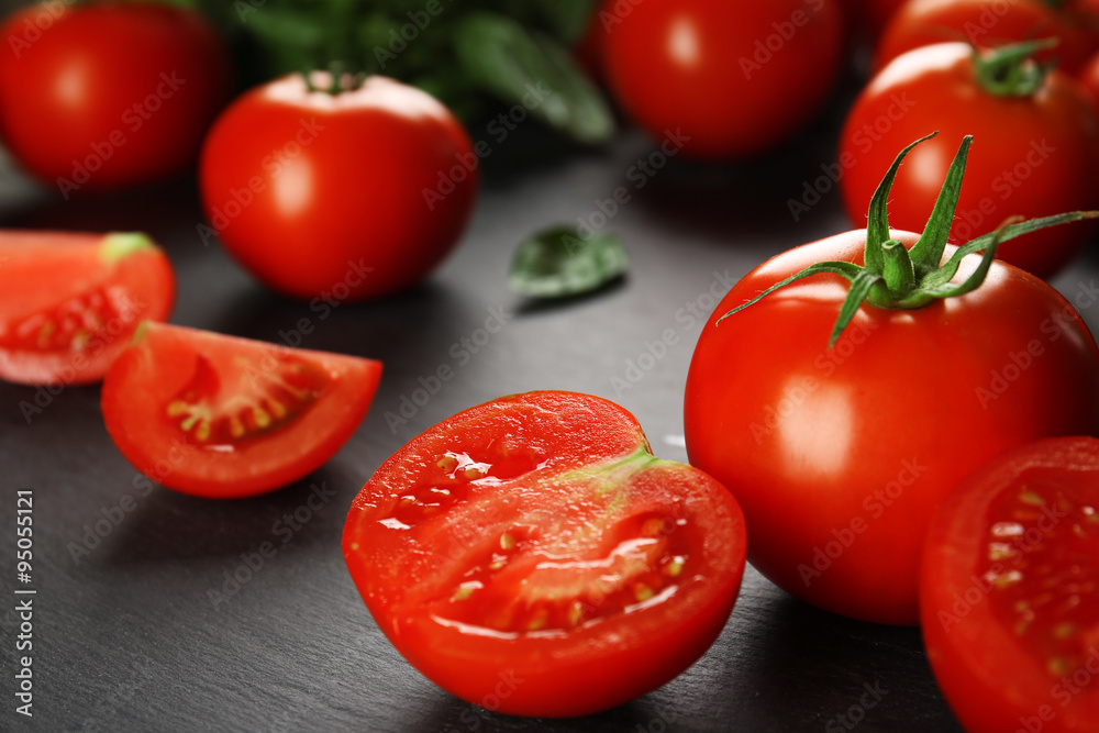 Red tomatoes on wooden background Red tomatoes on wooden background