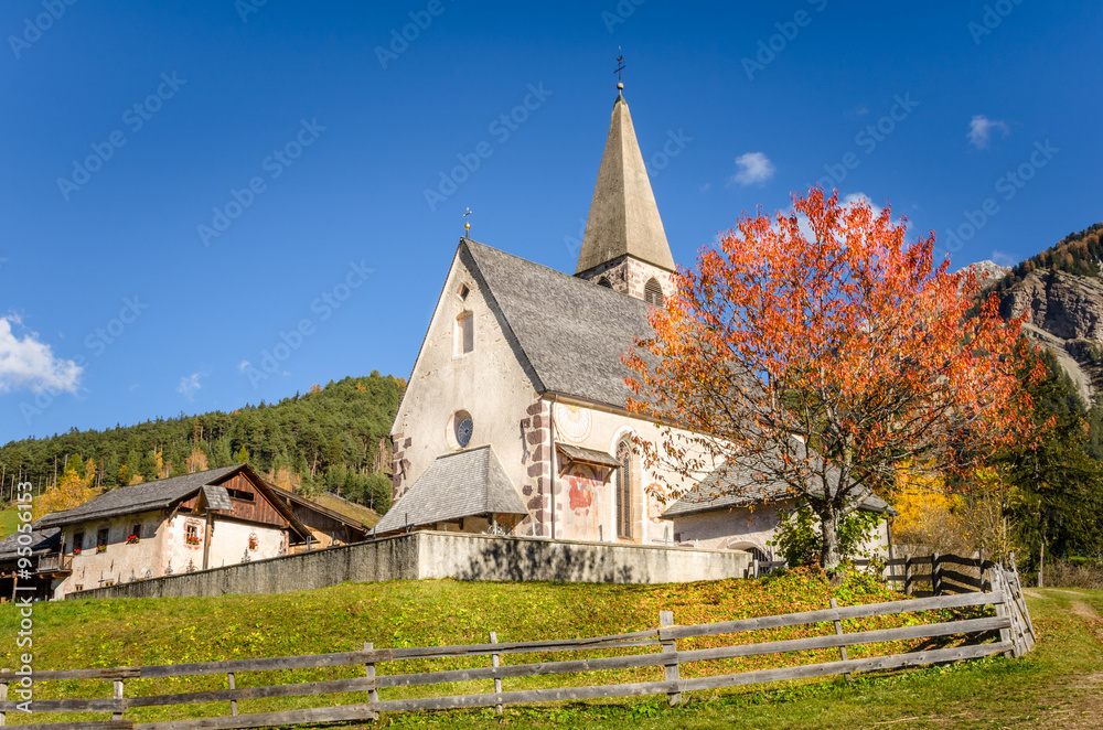 Traditional Alpine Church in Autumn