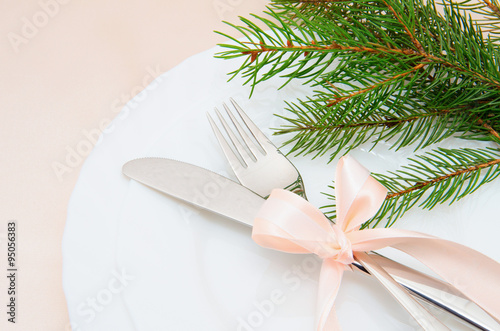 Christmas table place setting with christmas decorations photo