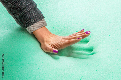 Fotografía Hand stamp on memory foam mattress