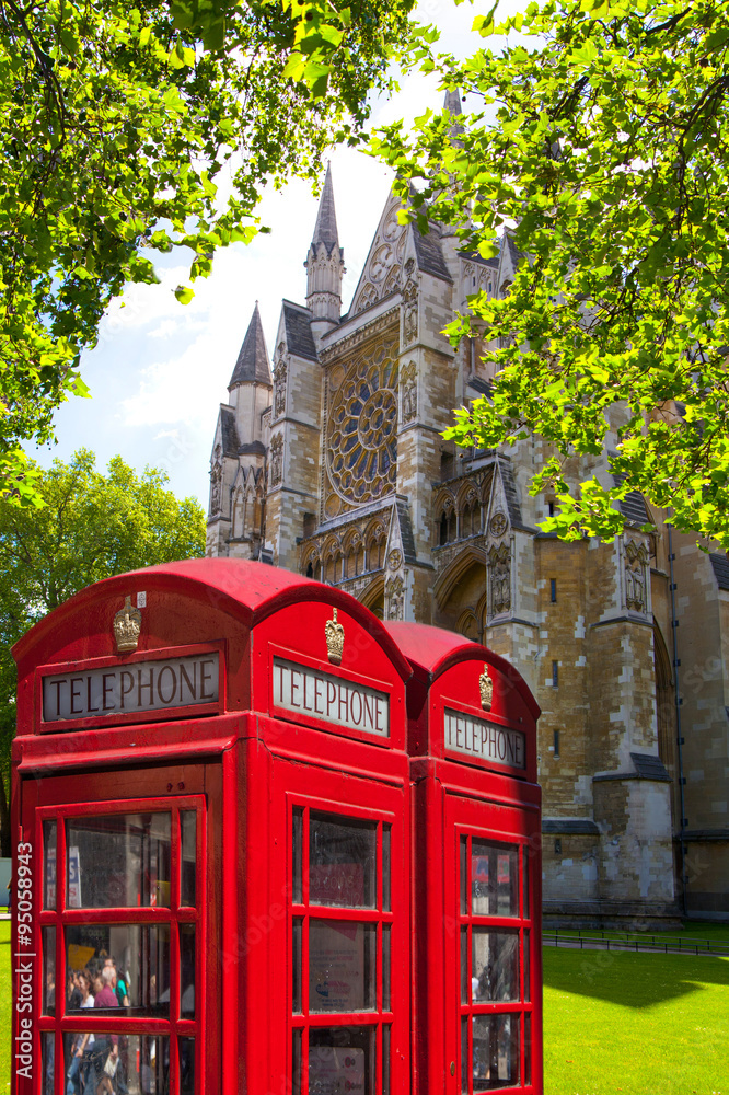 Red British telephone box in front of Westminster cathedral, London