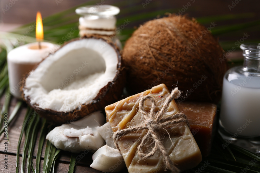 Spa coconut products on dark wooden background Spa coconut products on dark wooden background