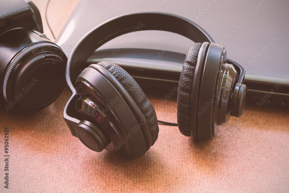 Headphones, laptop and camera Headphones, laptop and camera