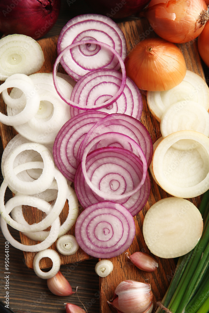 Sliced different onions background