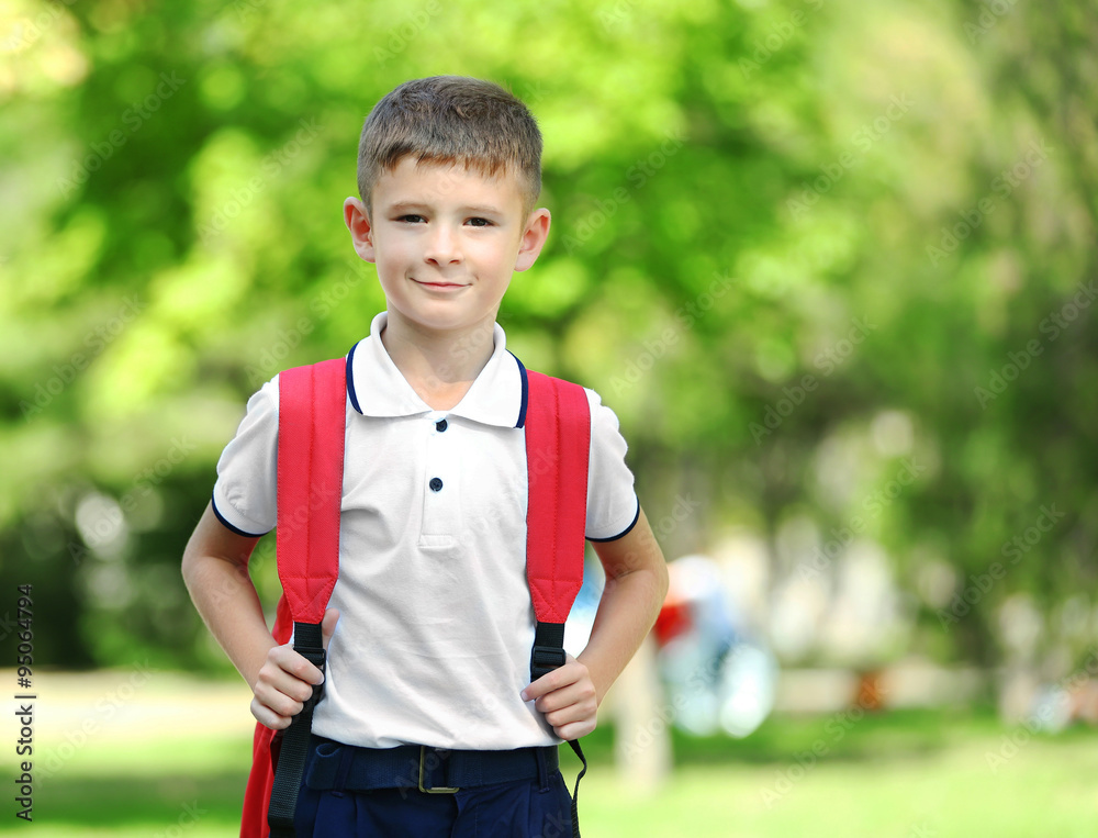 Little boy with large school bag, outdoor Little boy with large school bag, outdoor