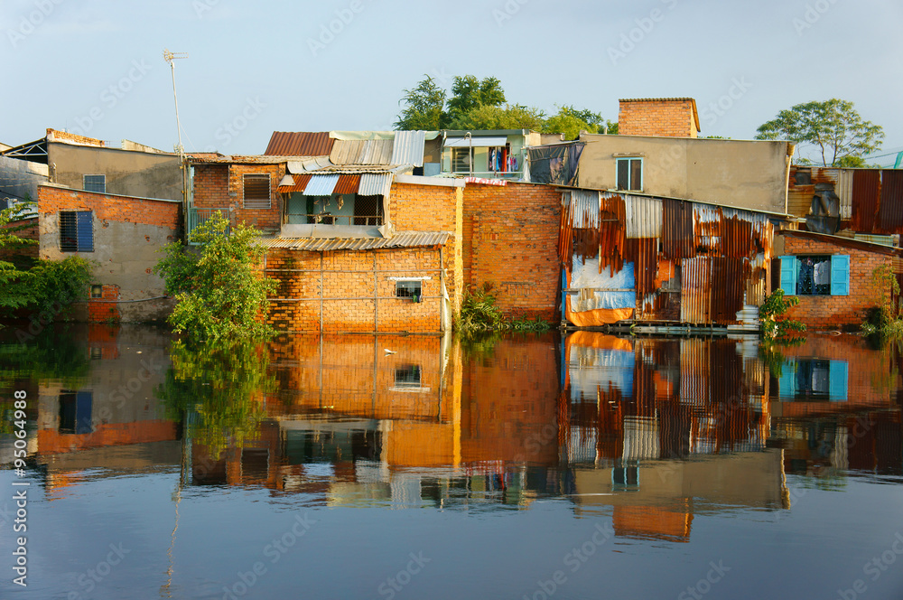 Fototapeta premium riverside downgrade house, brick wall, poor