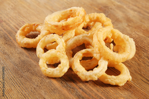 Chips rings on wooden background © Africa Studio