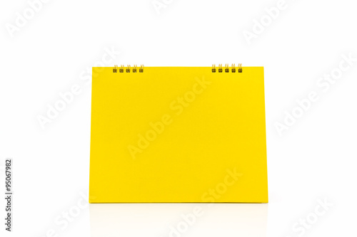 Yellow blank paper desk spiral calendar.