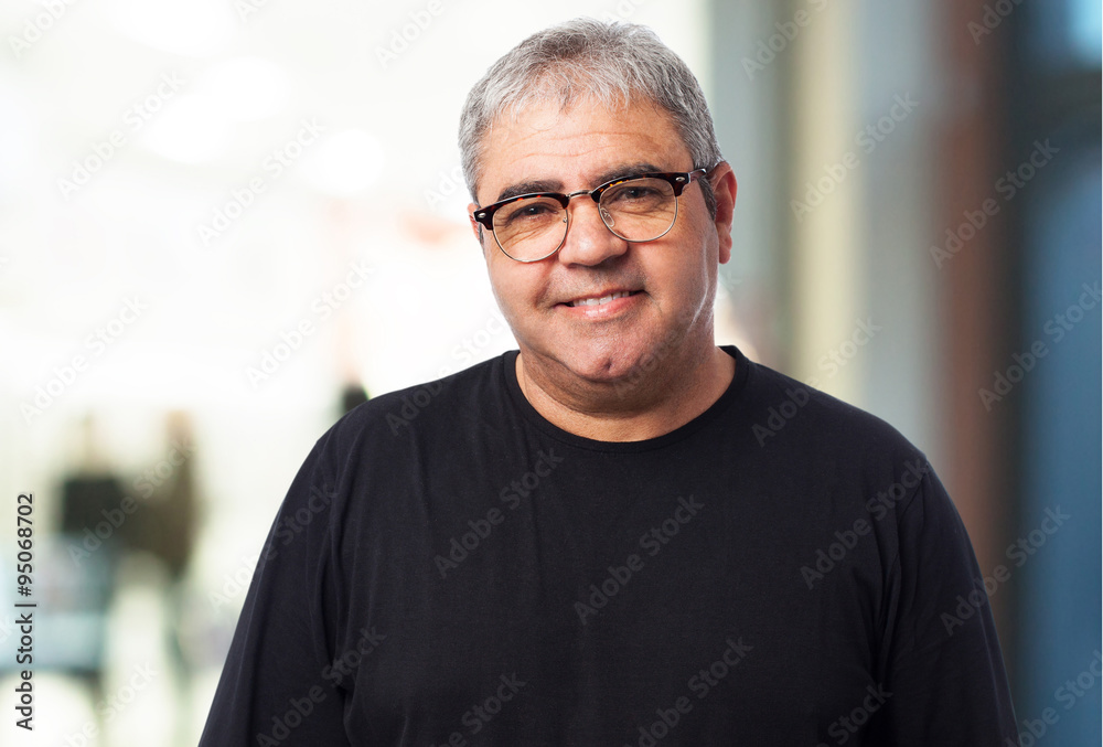portrait of a mature man wearing glasses portrait of a mature man wearing glasses