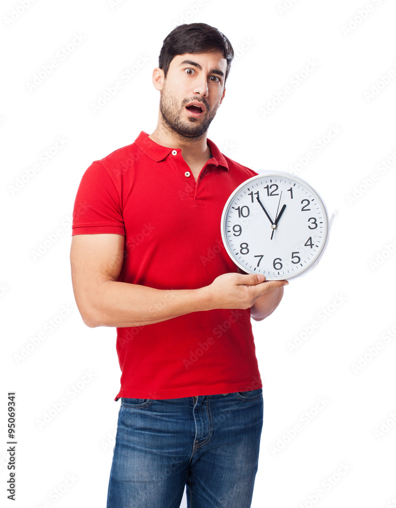 worried young man with clock worried young man with clock