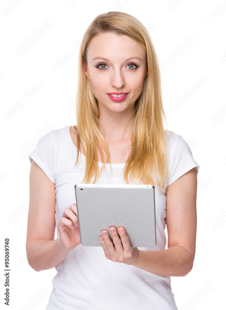 Caucasian young woman use of the tablet pc Caucasian young woman use of the tablet pc