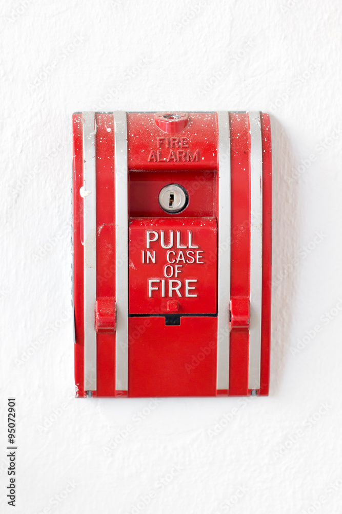 Red fire alarm pull switch isolated on white. Red fire alarm pull switch isolated on white.