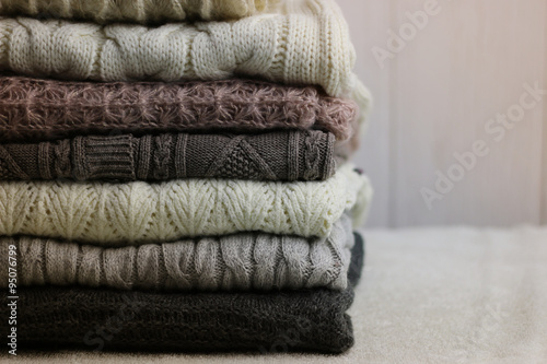 stack of sweaters knitted autumn concept