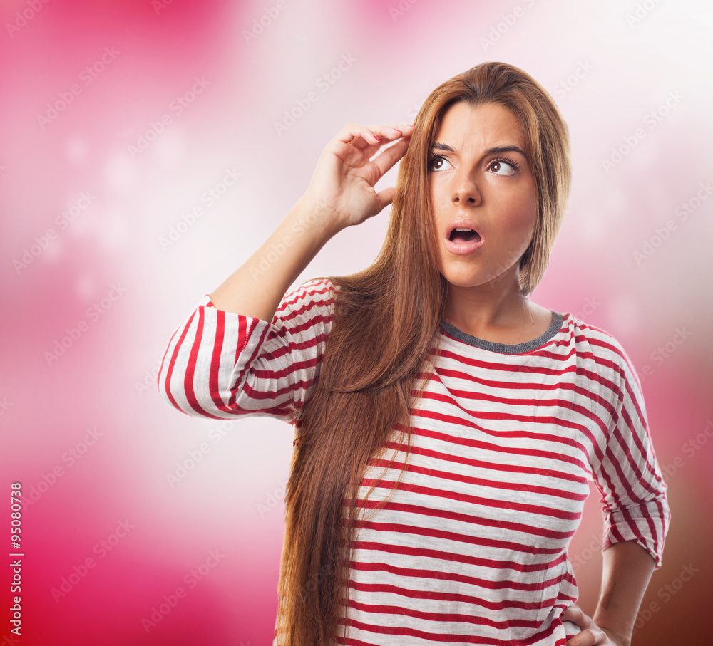 portrait of a worried young woman with a pensive gesture portrait of a worried young woman with a pensive gesture