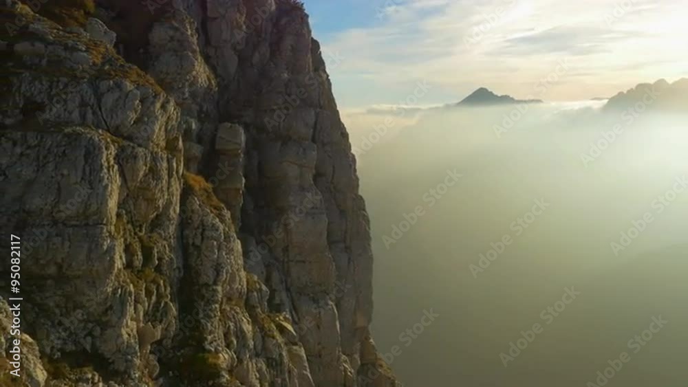 AERIAL: Vast mountain wall in European Alps AERIAL: Vast mountain wall in European Alps