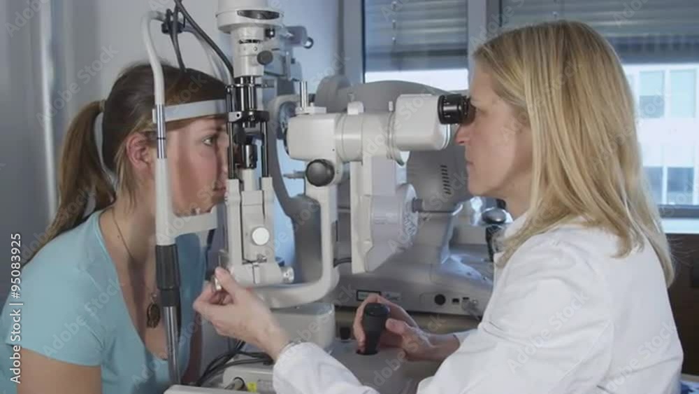 Young girl patient is having a medical attendance at the optometrist Young girl patient is having a medical attendance at the optometrist