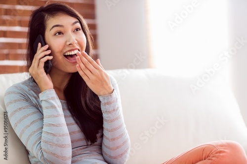 Asian woman on the phone