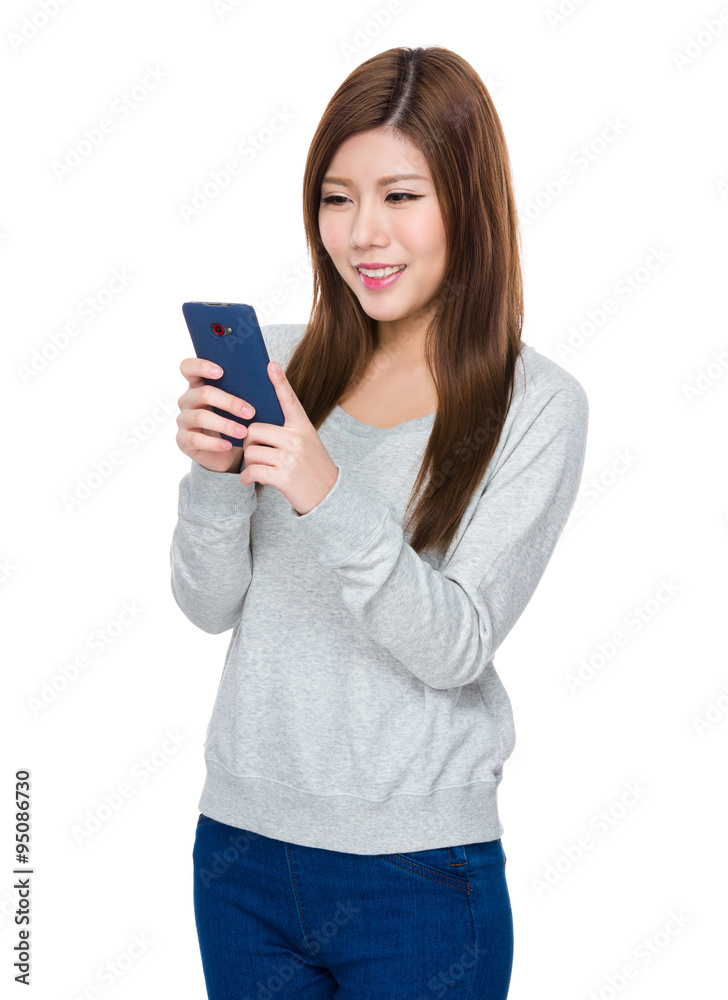 Asian Young Woman use of the mobile phone Asian Young Woman use of the mobile phone