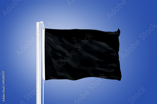 Fotografija Black flag flying against clear blue sky
