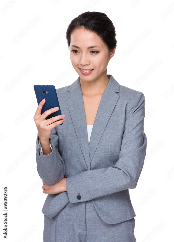Young Businesswoman use of the mobile phone Young Businesswoman use of the mobile phone